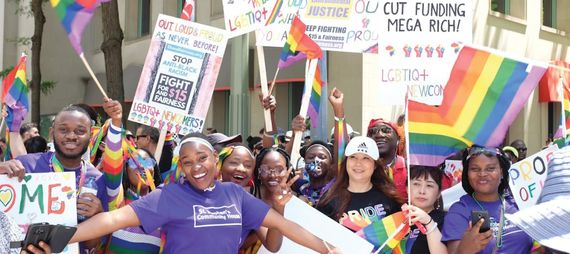 Rainbow Connect staff and participants having fun during the Pride Parade