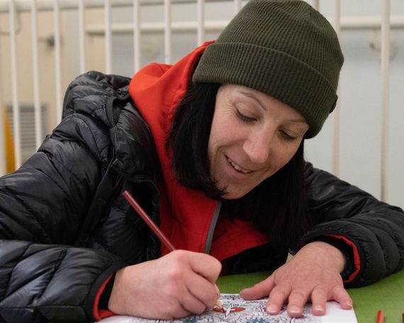 woman drawing on paper