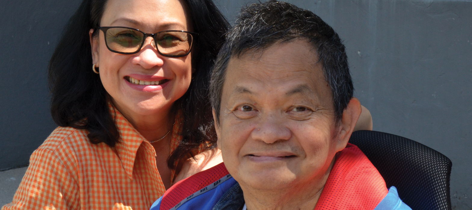 smiling man and caregiver