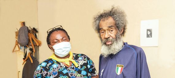 man with personal support worker