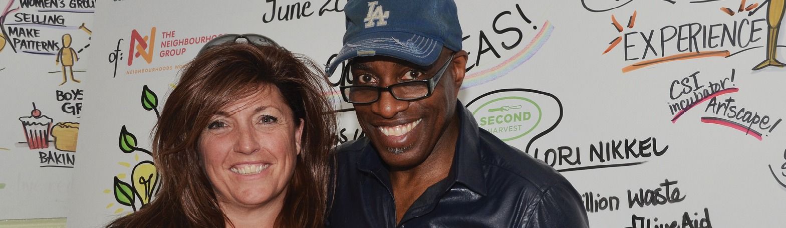 woman and man in front of Bright Ideas banner