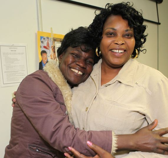 2 woman hapilly hugging