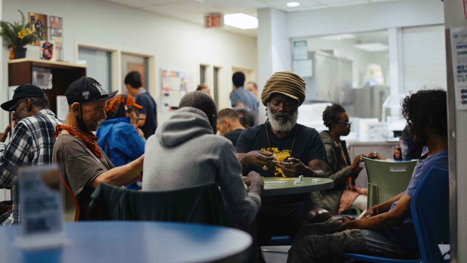 group of people sitting in the Corner Drop-in