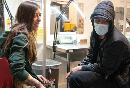 woman and man in Kensington Market Overdose Prevention Site