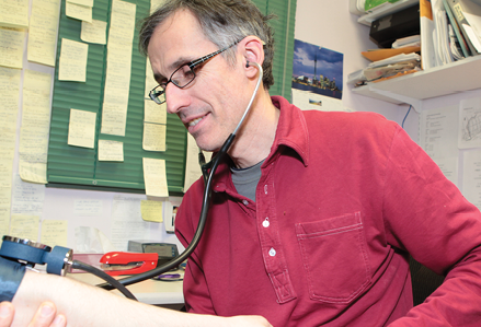 doctor examining a patient